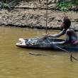 WomanCookingFish_OM69190